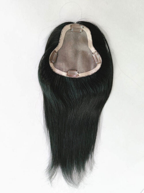 A black wig is shown with no hair.